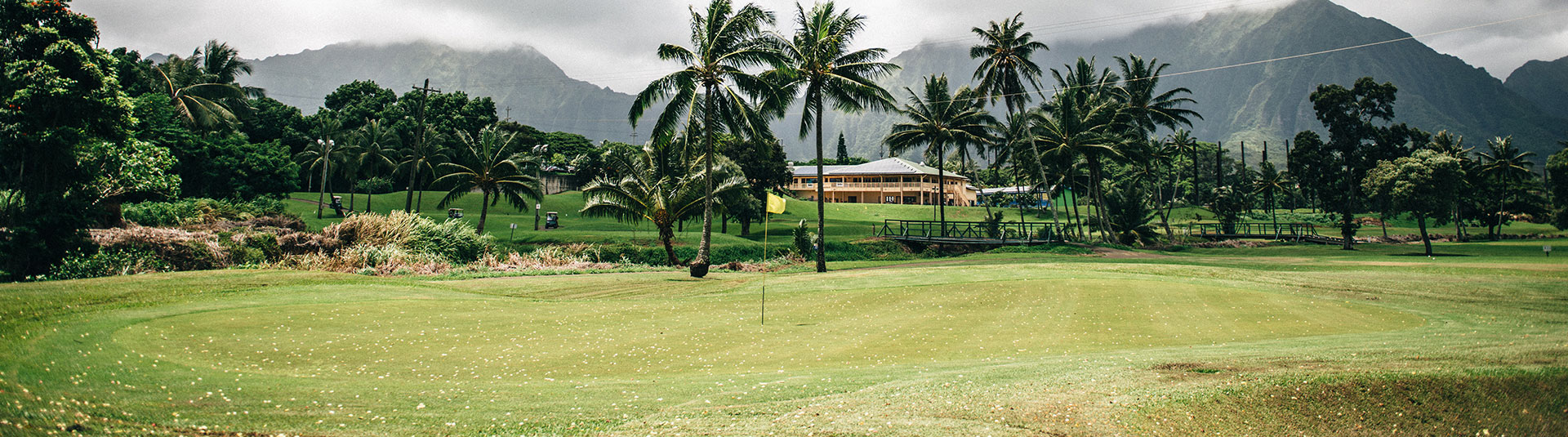 view of the golf course with clubhouse